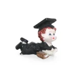Sleeping Graduated Boy Figure - 8" Resting Graduate Statue in Cap & Gown, Whimsical Graduation Decor & Gift for 2024 Grads